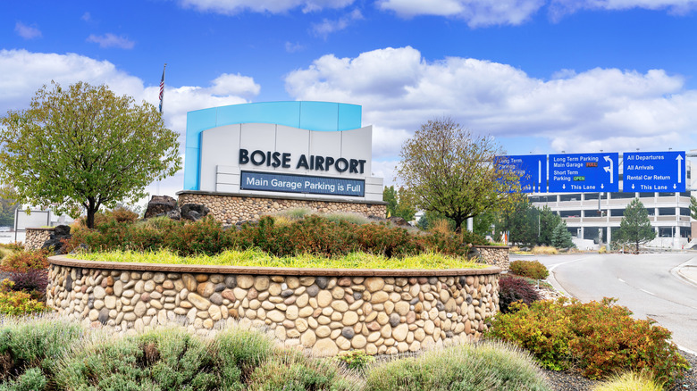 Boise Airport signage with decorative garden