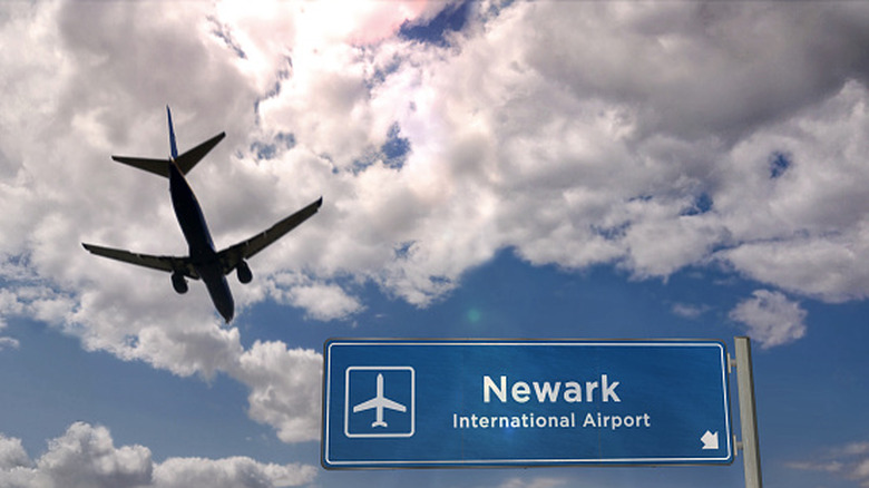 Airport silhouette as it lands at Newark-Liberty International Airport