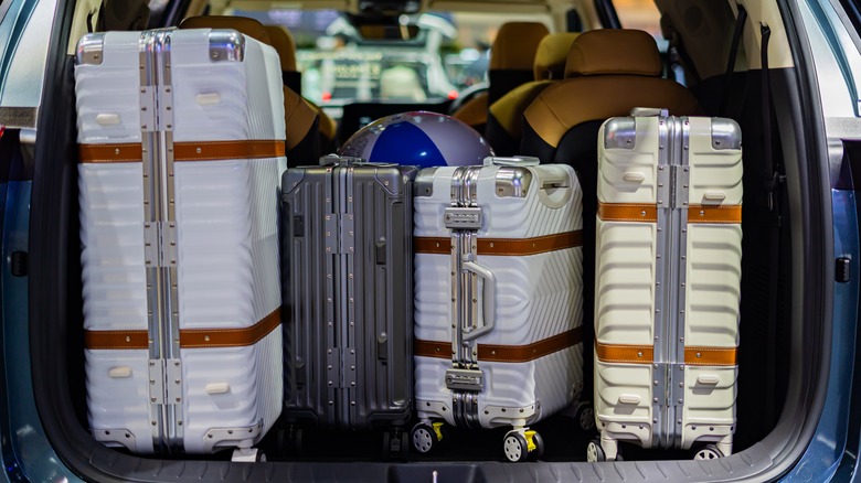 Suitcases in the trunk of a large vehicle