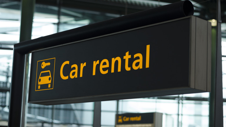 Car rental sign in airport
