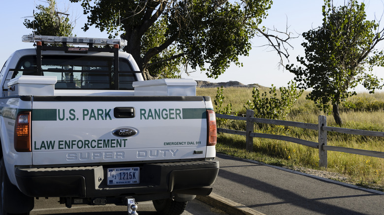 A U.S. park ranger pickup truck parked in Badlands National Park