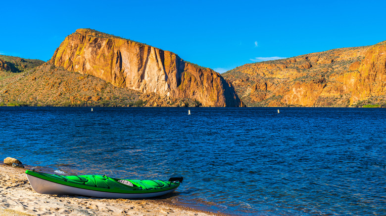 A kayak on the shoreline of Apache Lake, Arizona