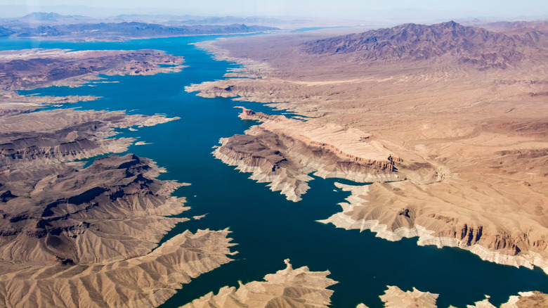 An aerial view of the desert terrain surrounding Lake Mead at the border of Arizona and Nevada