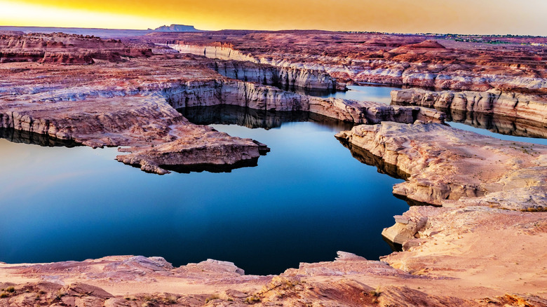 Stripy red rocks around Lake Powell in Arizona at sunrise