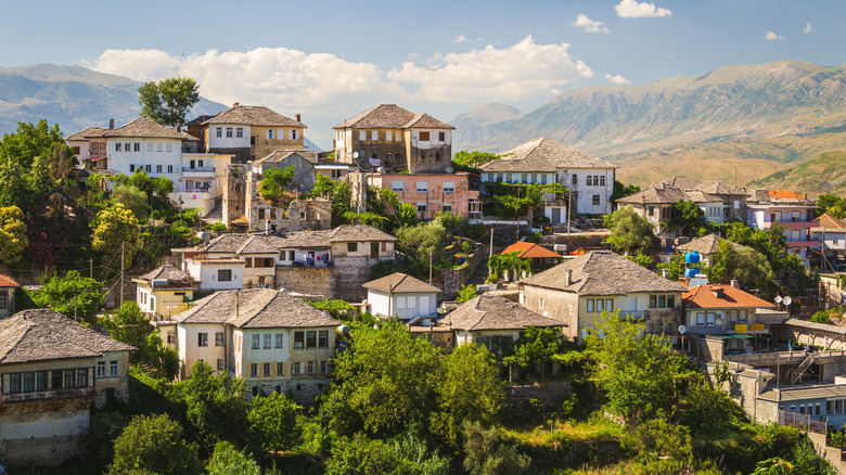 Aerial view of of Gjirokastra, Albania with mountains in the background