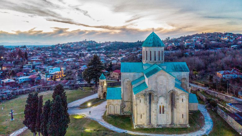 Drone shot of blue hour at Bagrati Cathedral in Kutaisi, Georgia