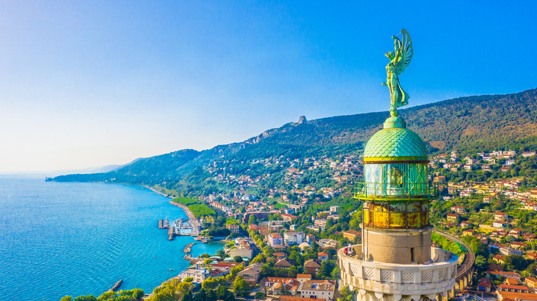 Aerial view of lighthouse and coastline in, Trieste, Italy