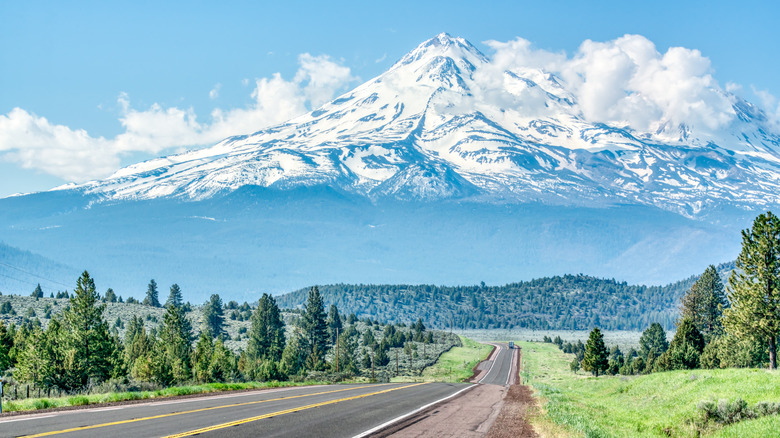 road leading toward volcanic mountain