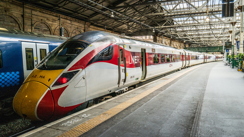 LNER Azuma high-speed train standing at a platform at Waverley Station, Edinburgh, Scotland