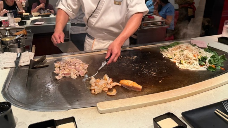 A hibachi chef at Teppan Edo in Disney's Japan pavilion, Epcot