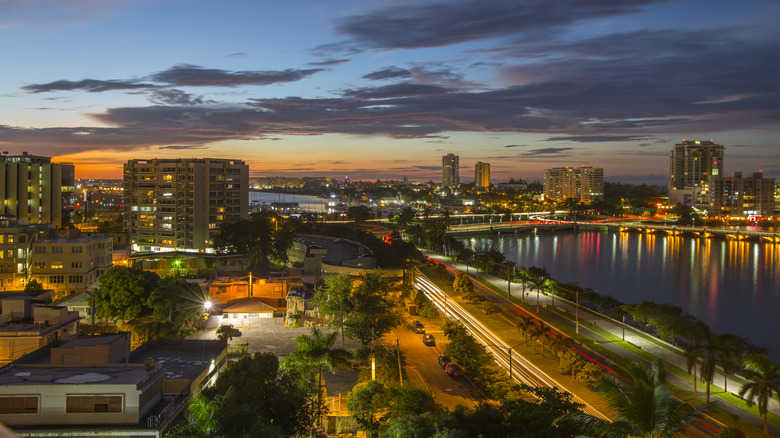 Overhead view of San Juan buildings and lagoon at sunset