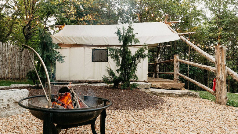 Luxury tent and fire pit at Ozark Mountain Adventure