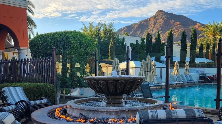 Fountain and pool with mountain scenery at Omni Scottsdale Resort and Spa