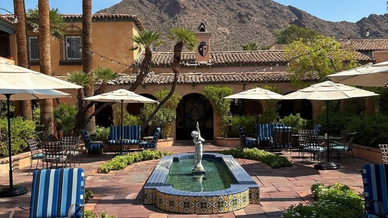 Courtyard with fountain and mountain at Royal Palms Resort and Spa