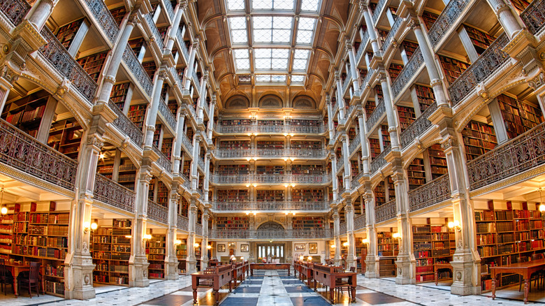 Grand entryway with ornate balconies of the George Peabody Library in Maryland
