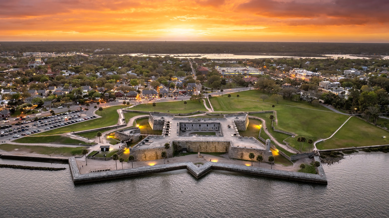 Aerial view of old castillo fort in St. Augustine, Florida, along the coast at sunset
