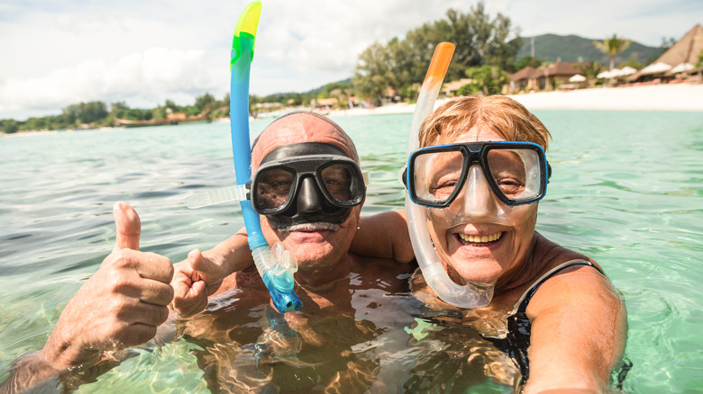 Couple snorkeling together