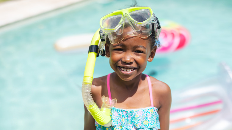 Girl wearing snorkel gear