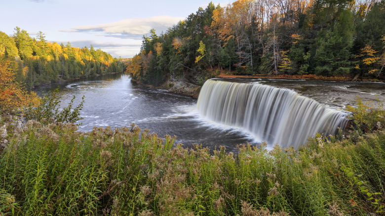 A panoramic view of the very picturesque Tahquamenon Falls and Tahquamenon River during Autumn, Upper Peninsula, Michigan