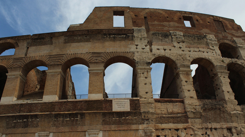 a close up on the arches of the colosseum