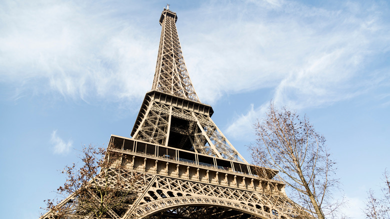 looking up at the eiffel tower