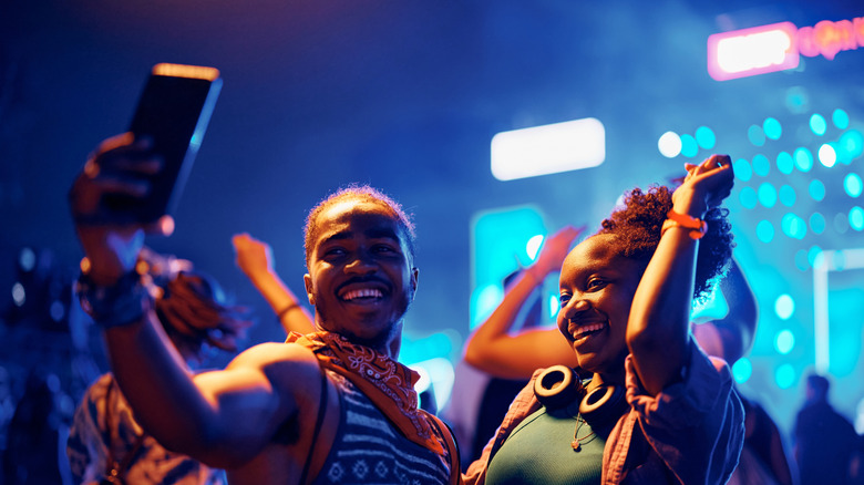 Couple dancing at a concert