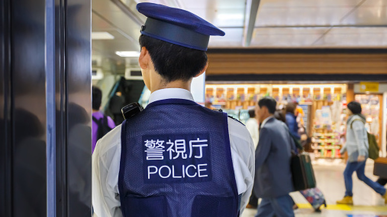 Back of a policeman in Japan