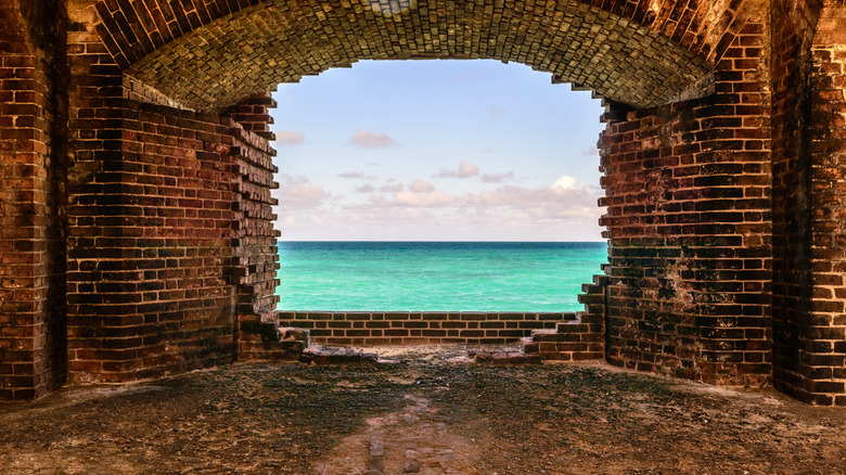 A view of the ocean through a wall in Fort Jefferson at Dry Tortugas National Park in Florida.