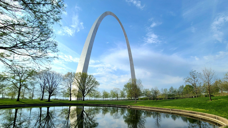 St. Louis' Gateway Arch reflected in a pond.