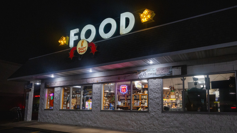 Nighttime exterior of the historic Cozy Dog Drive In restaurant on Route 66, Springfield, Illinois