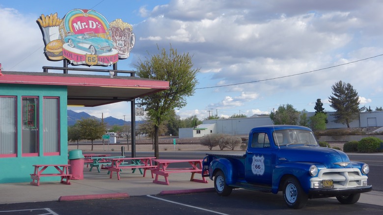 Mr. D'z Diner with a blue vintage truck outside in Kingman, Arizona