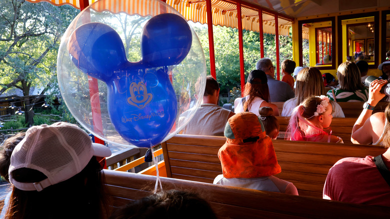 Passengers riding Walt Disney World Railroad