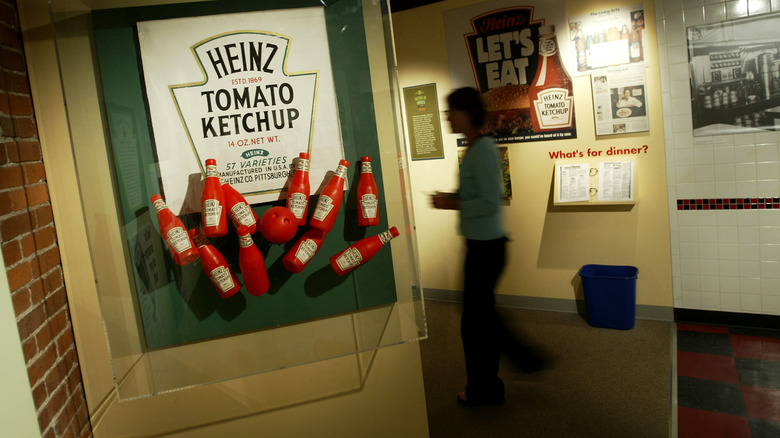 A woman walks through an exhibit showing the history of the Heinz corporation at the U.S. Senator John Heinz Pittsburgh Regional History Center in Pittsburgh, Pennsylvania