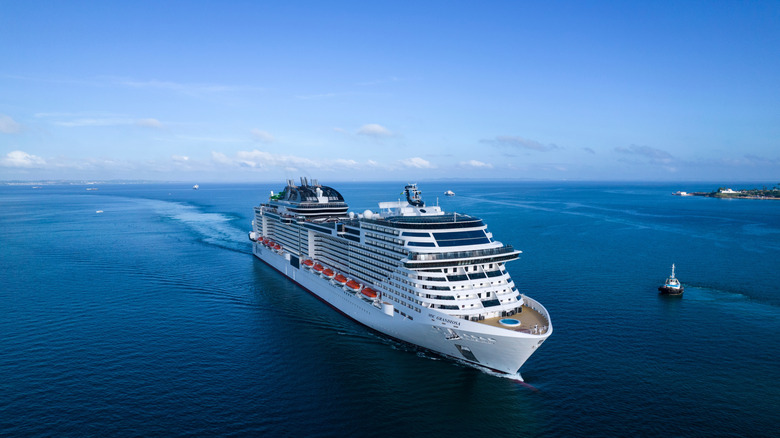 MSC Grandiosa cruise ship sailing in open water on a sunny day