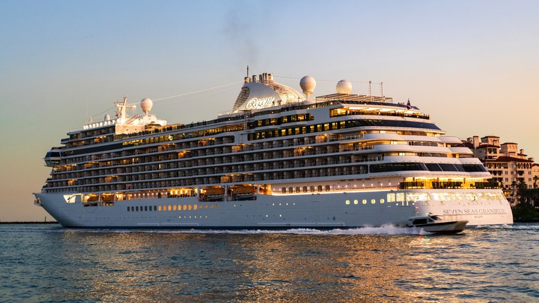 Regent Seven Seas Grandeur ship leaving the Port of Miami at sunset
