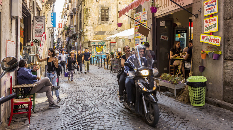 People and scooter on the Spaccanapoli