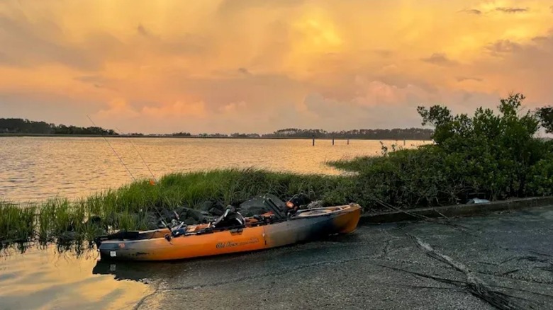Fishing kayak on boat ramp at Butter Bean Beach in Savannah, Georgia