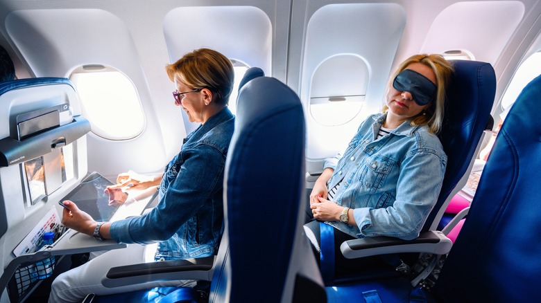 Two female passengers in window seats