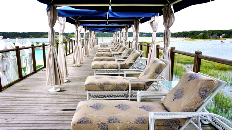 Lounge chairs on the pier at Wequassett Resort and Golf Club, Massachusetts