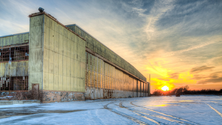Derelict building Floyd Bennett Field with sunrise and clouds