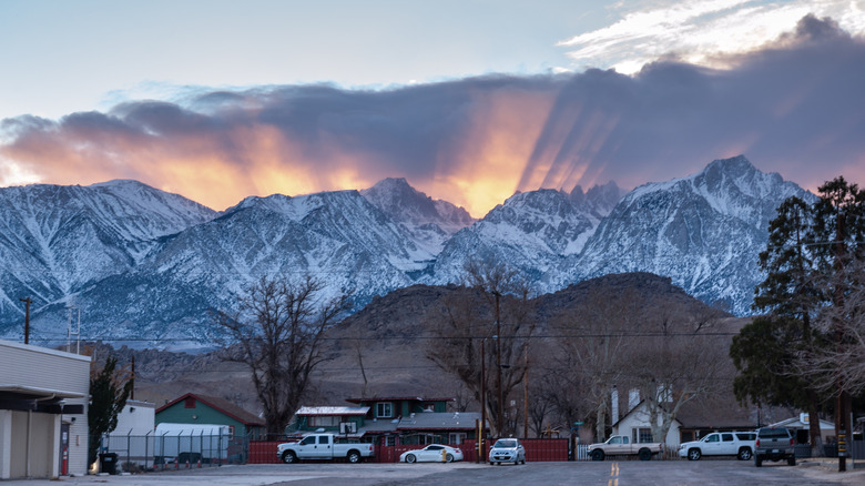 Snow-covered mountains rise behind the town of Lone Pine, California