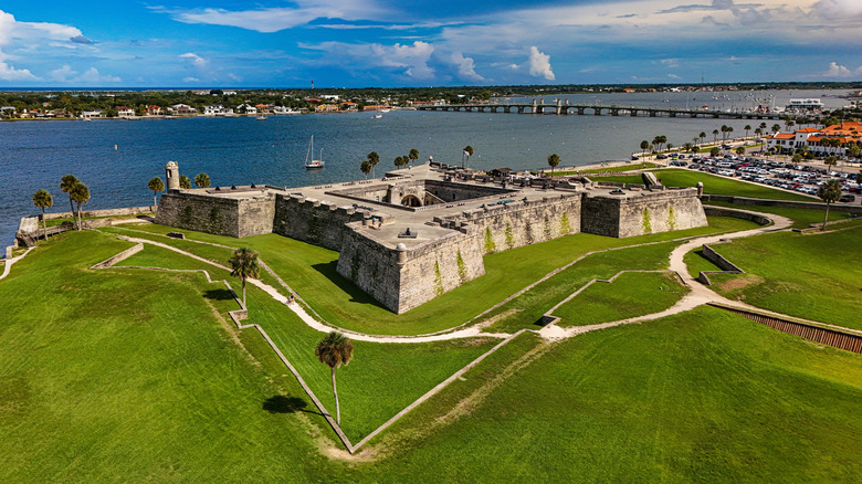 Aerial view of a historic fort overlooking the ocean in St. Augustine