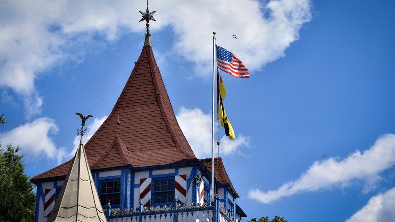 The American flag flies over a traditionally German building in Georgia