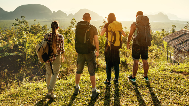 Four backpackers in Asia