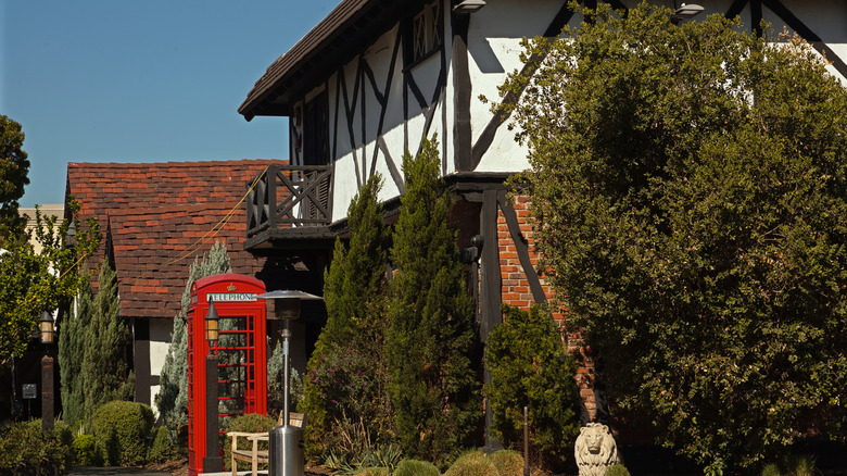 Tam O'Shanter exterior in LA, surrounded by trees and shrubs