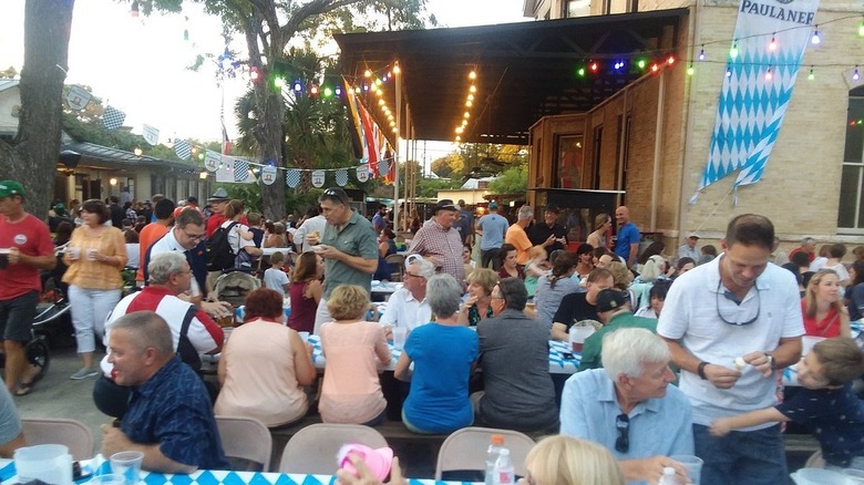 A shot of the crowded beer garden at Beethoven Maennerchor Halle in San Antonio, Texas