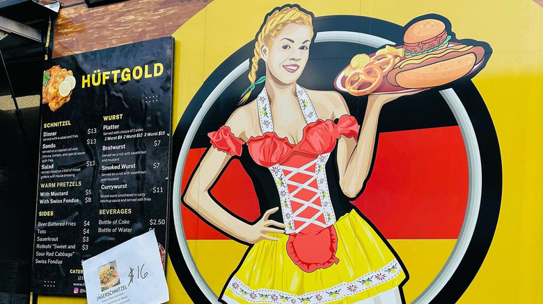 Exterior of the Huftgold food truck and menu sign in San Antonio, Texas