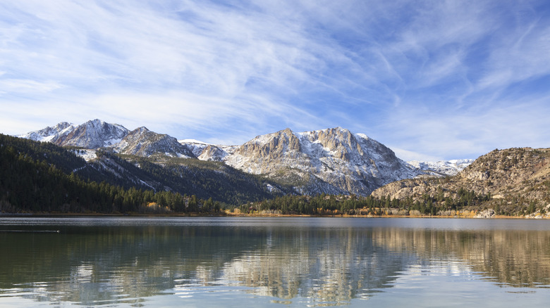 Snowy peak reflected in June Lake ripples in California