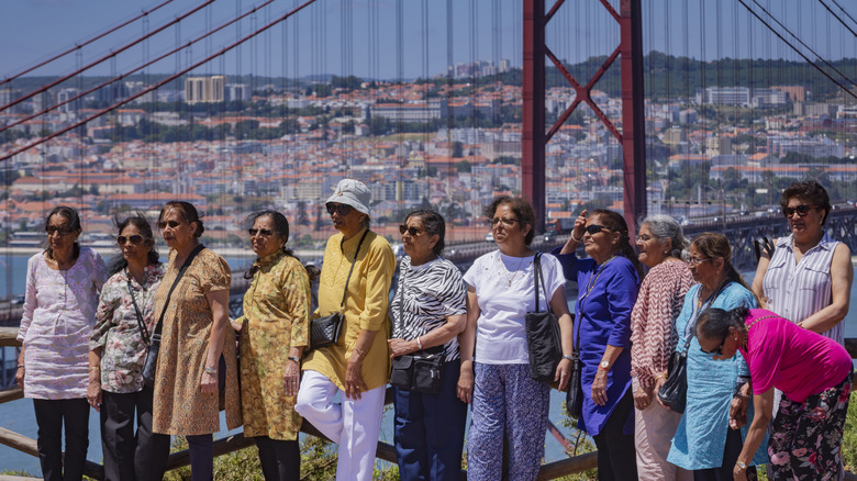 Group of tourists posing in Lisbon