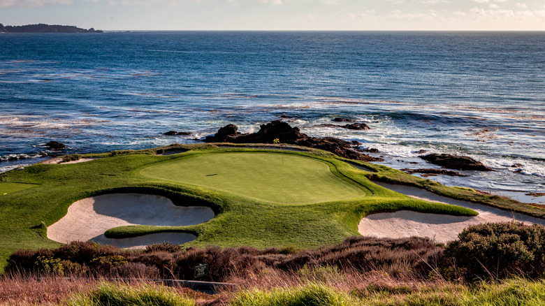 A golf green overlooking the Pacific Ocean in Monterey, California